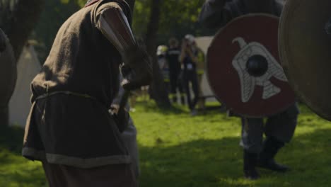 Medieval-Knights-Sword-Fighting-during-Modern-Show-on-Sunny-Day