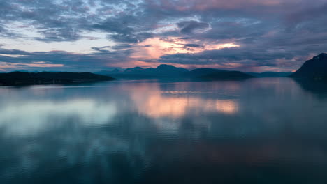 Colourful-sunset-and-reflection-in-Norwegian-fjord