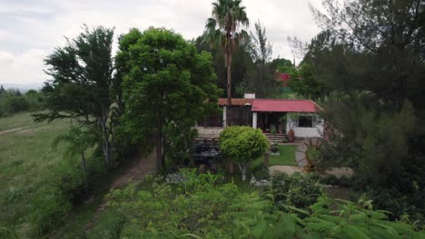 Aerial-view-of-traditional-home-in-Villa-de-Etla,-Oaxaca,-Mexico-with-a-pool