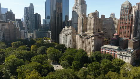 Aerial-view-tilting-toward-the-15-Central-park-west,-sunny-day-in-New-York,-USA
