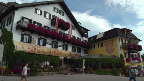 Austrian-Flags-Waving-in-the-Wind-on-the-Beautiful-House-in-Saint-Gilgen-Spa-Town