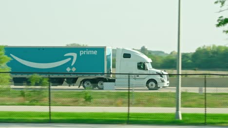 slow-motion-of-Amazon-tractor-and-trailer-driving-on-highway