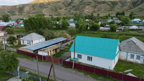 Fly-Above-Rustic-Settlements-In-The-Mountain-Village-Of-Saty,-Kazakhstan,-Central-Asia