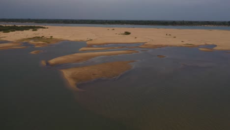 amazon-river-riverbed-sand-dunes-due-to-severe-drought,-aerial-drone-flyover-shot