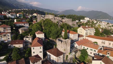 Kanli-Kula-Fortress,-Herceg-Novi,-Montenegro-with-panoramic-coastal-views---aerial