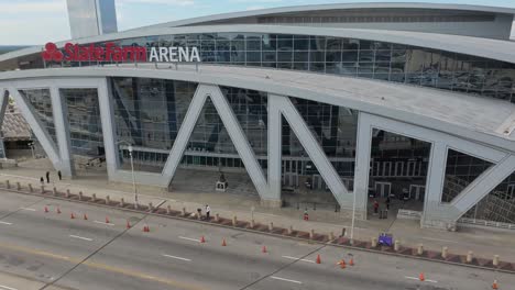 Aerial-panning-shot-of-State-Farm-Arena-in-Atlanta-City-during-daytime