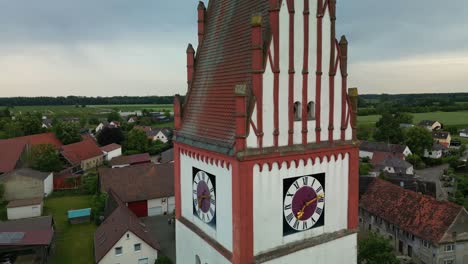 Spire-and-clock-of-Saint-Mariä-Geburt-Church-in-Bubesheim-in-Germany