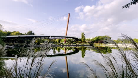 Drumul-Taberei-Park,-suspension-bridge-and-lake,-Bucharest-Romania