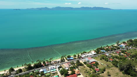 Aerial-view-of-bang-por-coast-on-Koh-Samui-Island-and-Koh-Phangan-in-background