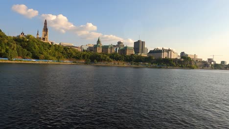 Ottawa-skyline,-Parliament-Hill-towers,-riverfront-view.-Canada