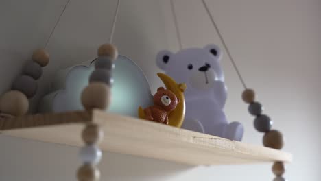 Baby-mobile-with-bear-and-squirrel-hanging
