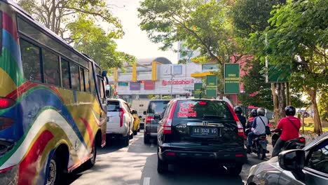 Busy-road-and-traffic-congestion-in-Indonesia-at-day