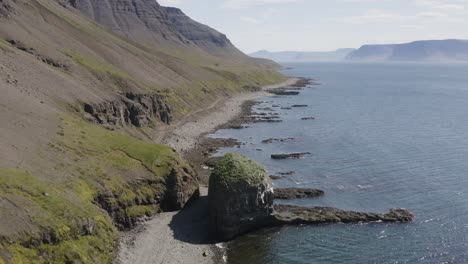 Flying-Above-Svalvogavegur-Cliffside-Road-In-Westfjords,-Iceland