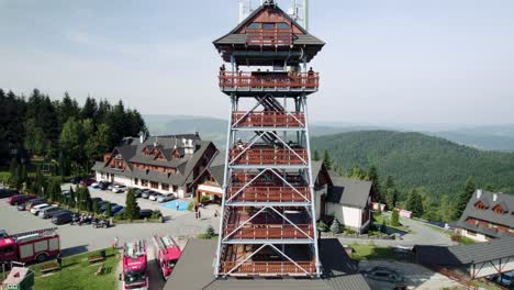 4k-Aerial-View-of-Fire-Fighters-Training-Session-on-Training-Tower-in-Mountains
