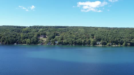 Aerial-view-of-Keuka-Lake-in-the-Finger-Lakes,-NY-looking-westward,-heading-south