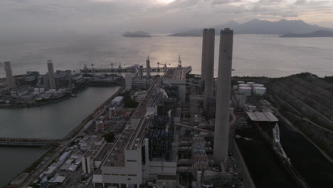 Coastal-Power-Station,-Lamma-Island,-Hong-Kong,-Fog,-Energy-Generation,-Sunset,-CInematic-Establishing-Shot