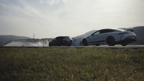 Zoom-closer-to-new-Mercedes-car-line-before-safety-driving-track-spray-rain