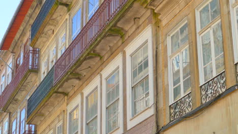 Historic-Architecture-Facade-And-Glass-Windows-In-Porto,-Portugal