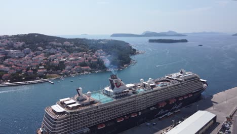 Passengers-boarding-Mein-Schiff-luxury-cruise-ship-liner-at-port-Gruz