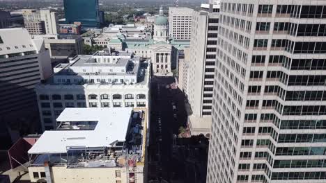 Aerial-establishing-shot-of-downtown-Indianapolis-during-the-day-with-traffic