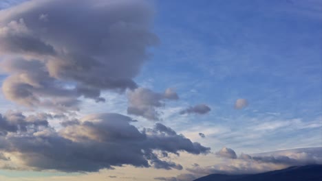 Timelapse-of-a-cloudy-blue-sky-at-dawn