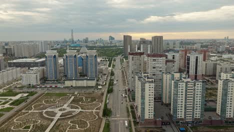 An-Outlook-of-Towering-Structures-in-Astana,-Kazakhstan---Drone-Flying-Forward