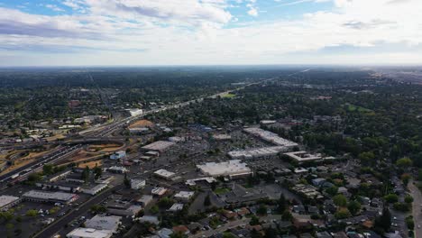 Aerial-view-overlooking-the-cityscape-of-Roseville,-partly-sunny-California,-USA