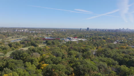 Aerial-push-over-Forest-Park-and-towards-the-St