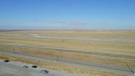 United-Airlines-Airplane-Landing-on-runway-at-Denver-International-Airport---Drone-Video