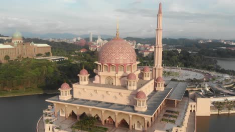 The-famous-Putra-Square-With-Putra-Mosque-at-Kuala-lumpur,-aerial