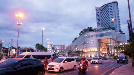 Front-view-of-Terminal-21-shopping-mall-with-Grand-Centrepoint-in-the-background,-in-Pattaya,-Chonburi-province,-Thailand