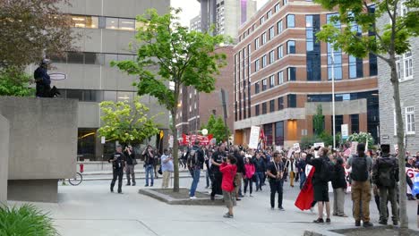 Protesters-peacefully-walked-past-government-buildings-carrying-Anti-G7-Summit-banners