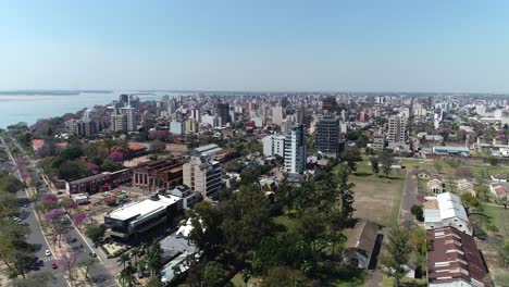 Aerial-view-captured-by-a-drone-displaying-the-city-center-of-Corrientes,-the-capital-city-of-the-province-in-Argentina