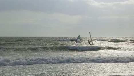 Windsurfing-in-Hayama-Japan,-extreme-wind-conditions-and-rough-waves