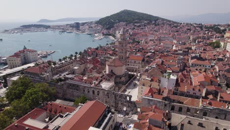 Split-Croatia-overlooking-Adriatic-Sea-at-midday,-classical-european-architecture,-panoramic-aerial-orbit