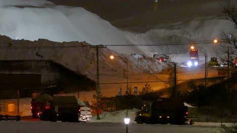 Trucks-traveling-to-a-snow-dump-location-in-Montreal