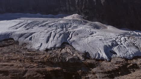 Glacier-in-mountains-approached-pan
