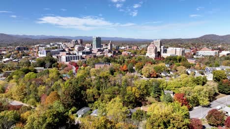 asheville-nc,-north-carolina-aerial-push-in-in-fall-to-skyline