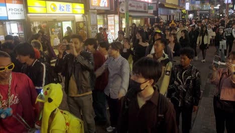 Crowds-of-people-in-Shibuya-Center-Gai-on-Halloween,-Tokyo-Japan