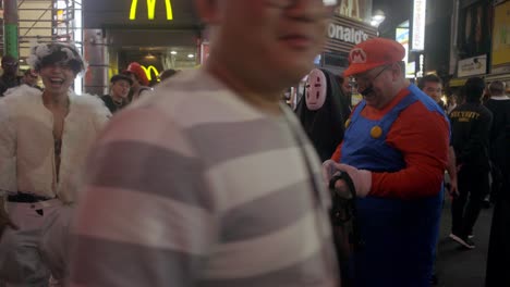 Crowds-of-people-in-Shibuya-Center-Gai-on-Halloween,-Tokyo-Japan