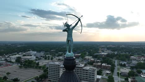 Kansa-warrior,-Ad-Astra,-statue-atop-Kansas-capitol-building-in-Topeka,-KS