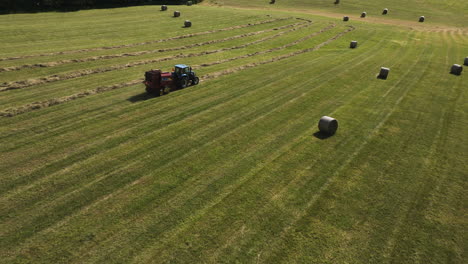 Aerial-Revealed-Straw-Baler-Agricultural-Machinery-On-Harvesting-Season