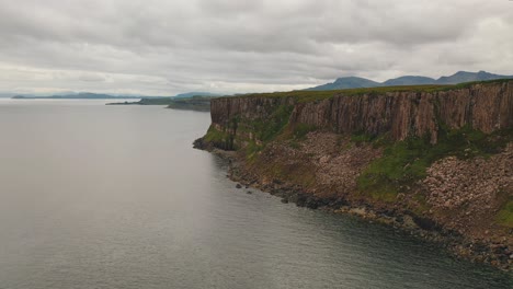 Aerial-Of-Rugged-Cliffs-On-Scottish-Coastline,-Isle-Of-Skye,-West-Coast-of-Scotland
