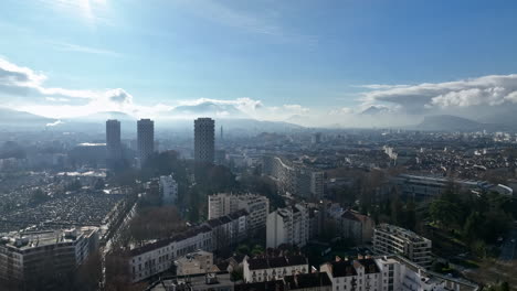 Grenoble-city-from-above-tall-residential-buildings-sunny-day