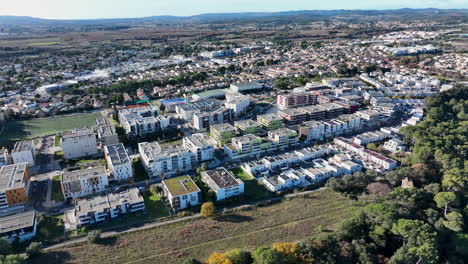 Aerial-tour-of-la-Mosson-on-a-clear-day,-a-testament-to-Montpellier's-blend-of-h