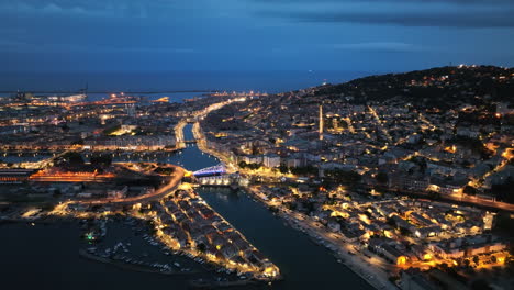 Sete-french-maritime-city-by-night-aerial-shot