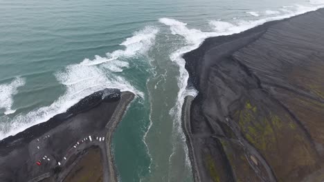 Drone-view-over-a-bridge-along-Jokulsarlon-in-Iceland