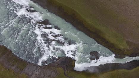 Aerial-drone-shot-flying-over-Gulfoss-in-Iceland.-Vertical-view