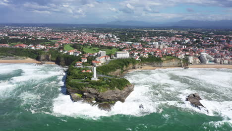 Beautiful-Biarritz-lighthouse-surf-destination-aerial-shot-sunny-day