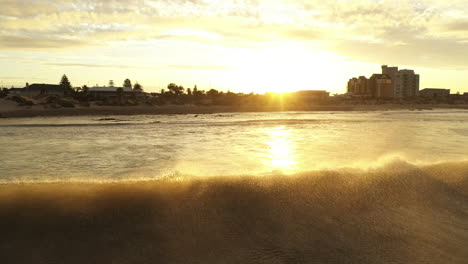 Following-a-wave-during-sunset-over-Port-Elizabeth-aerial